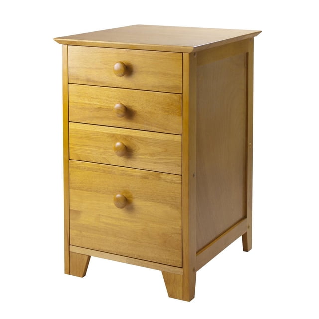 Studio File Cabinet with a honey finish, constructed from solid wood and composite. It features three small drawers with round wooden knobs and one large bottom file drawer for legal and letter-sized files. Compact design ideal for home or office organization.