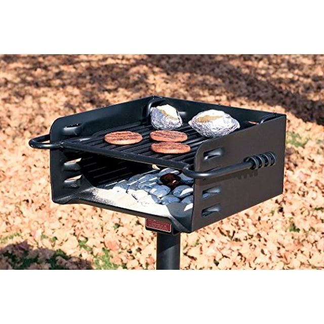 Pilot Rock Heavy-Duty Park-Style Grill - Model# H-16 B6X2, made of 3/16-inch plated steel with an 8-inch deep firebox and a 16 x 16-inch cooking surface. This black charcoal grill features a 4-level adjustable grate, a 360-degree rotating firebox for draft control, and tilt-away access for cleaning. It includes a 2.38 x 20-inch steel post for permanent installation. The image shows the grill outdoors with burgers and foil-wrapped potatoes on the grate, with charcoal briquettes below. Suitable for backyard or park grilling.