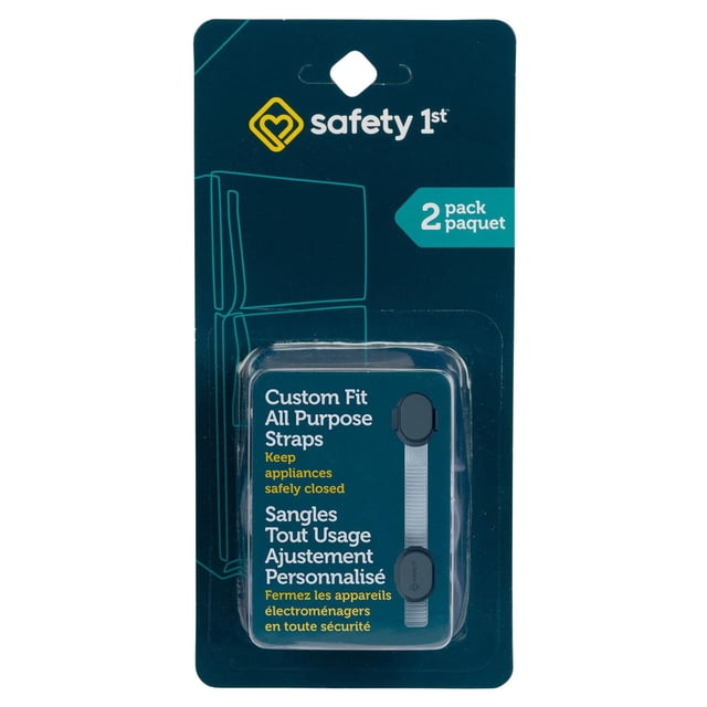 Safety 1st Custom Fit All Purpose Strap 2-pack in dark teal packaging with white and yellow text, featuring adjustable white plastic straps with dual press release locks and adhesive mounts, designed to keep appliances and cabinets safely closed for baby proofing and child safety.