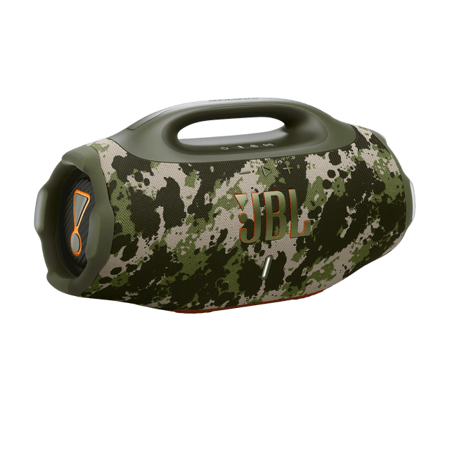 JBL Boombox 4 portable Bluetooth speaker with green and beige camouflage fabric, built-in handle, top control buttons, and orange JBL logo, featuring waterproof and dustproof design, long playtime, and multi-speaker connection for outdoor audio use.