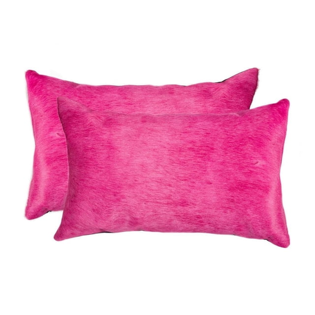 TORINO COWHIDE PILLOW 12"X20" 2-PACK with two vibrant pink rectangular pillows crafted from 100% natural Indian cowhide, featuring soft hair texture, hand-stitched edges, hidden zipper closures, and polyfil inserts, suitable for layering in home décor to add warmth and texture.