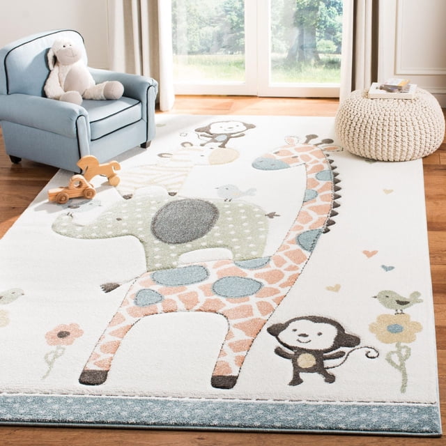 Safavieh Carousel Kids Taneka Animals at Play Area Rug with pastel storybook animal designs including giraffe, elephant, monkey, zebra, and birds on a white background. This durable, power-loomed synthetic yarn rug adds soft, colorful decor and comfort to kids' rooms, shown with a blue armchair, wooden toys, and knitted pouf near a sunlit window.