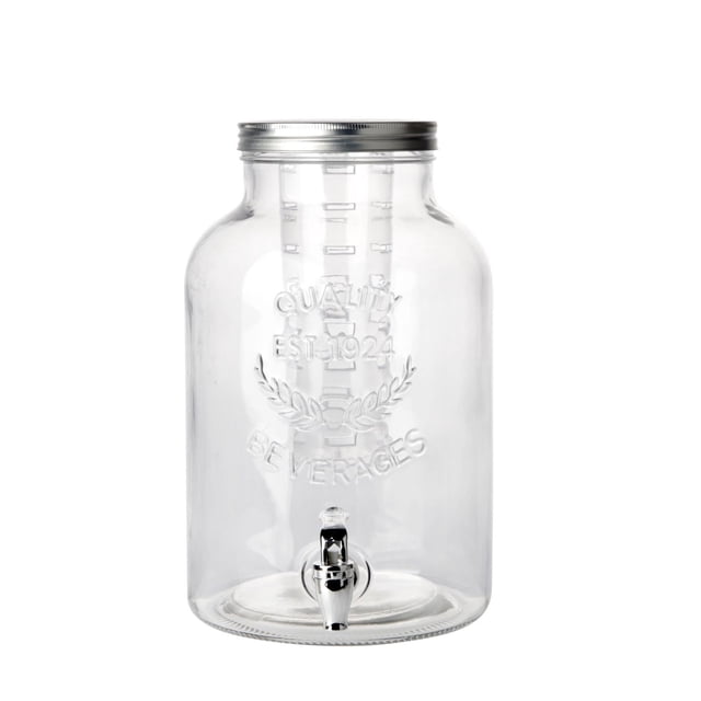 Hometrends Clear Glass Beverage Dispenser, 2 Gallon, 1 Piece, clear glass container with embossed 'Quality Est. 1924 Beverages' text, metal screw-on lid, and plastic chrome spigot, designed for cold drinks like iced tea or lemonade, ideal for kitchen or patio use.
