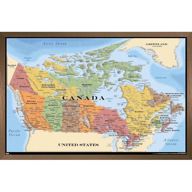 Map - Canada Wall Poster, 22.375" x 34" framed featuring a detailed political map of Canada with color-coded provinces and territories including Yukon, Northwest Territories, Nunavut, British Columbia, Alberta, Saskatchewan, Manitoba, Ontario, Quebec, New Brunswick, Prince Edward Island, Nova Scotia, and Newfoundland & Labrador, bordered by the Arctic, Pacific, and Atlantic Oceans and the United States, with major cities and water bodies labeled, in a brown wooden frame suitable for home or office wall decor.