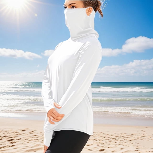 Ovbmpzd Sun Protection Womens Tops Trendy Long Sleeve White Solid Breathable Tees Womens Tunic Tops XXXXL. A breathable, lightweight white long-sleeve top made of 100% polyester, featuring a shawl collar, thumb holes, and a fitted design for sun protection. Ideal for outdoor activities such as hiking, running, and biking. Shown on a beach under a sunny sky.