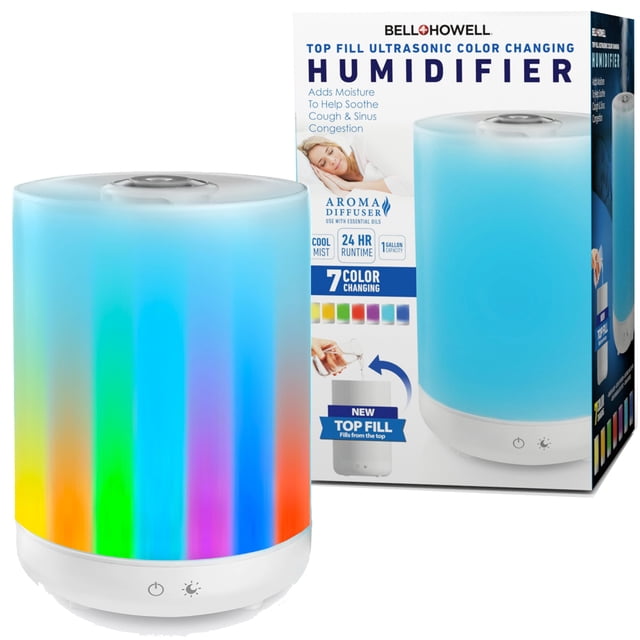 Bell + Howell Diffuseur Humidificateur à Remplissage par le Haut 4 L Brume Fraîche Air Présentant un design Cylindrique Élégant avec un Affichage Lumineux à Lumière DEL 7 Couleurs. l'Humidificateur Comprend un Réservoir à Remplissage par le Haut pour des Recharges Faciles, un Diffuseur d'Arômes Intégré pour Huiles Essentielles et des Niveaux de Brume Réglables. Il a une Capacité de 1 Gallon, Offrant jusqu'à 24 Heures d'Hydratation Continue. le Produit Est Montré aux Côté de Son Emballage, Mettant en Valeur des Caractéristiques comme un Fonctionnement Ultra Silencieux, des Bienfaits pour la Santé contre la Toux et le Soulagement des sinus