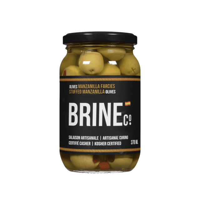 Brine Co Manzanilla Stuffed Olives 370ML Jar featuring a clear glass jar filled with green Spanish Manzanilla olives stuffed with pimentos, sealed with a black lid and black label highlighting artisanal curing, kosher certification, and gluten-free, ideal for pantry condiments and toppings.