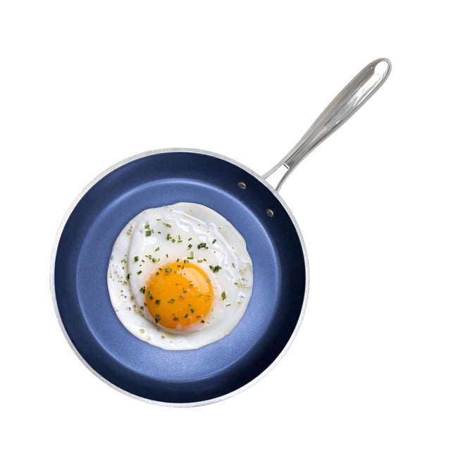 GraniteStone Diamond Blue 12" non-stick frying pan with a sunny-side-up egg garnished with herbs, showing the blue mineral-infused nonstick surface and stainless steel handle in a top-down view on a white background.