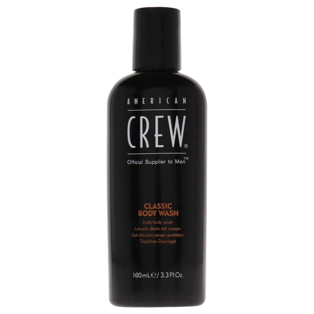 Classic Body Wash by American Crew for Men - 3.3 oz body wash in a sleek black bottle with bold white branding and orange text. Ideal for travel size body care, it features a refreshing blend of spice and citrus for a clean, masculine scent.