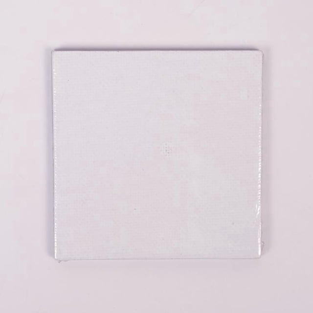North Shore magnetic mini canvas 2.6 by 2.6 inches, a small square white canvas panel with textured surface and magnetic backing, ideal for mixed media art projects and easy display on magnetic surfaces.