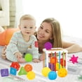 thumbnail image 1 of B Infant Sensory Activity Toy, Rainbow Elastic Shape Sorter Box With Strings, Bells, And Handheld Balls, Fine Motor Skills For Babies And Toddlers, Version B, 1 of 9