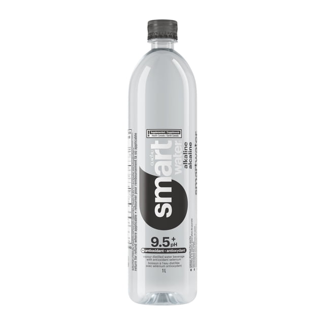 Glaceau Smartwater Alkaline with Antioxidant Bottle, 1 Liter, clear plastic bottle with black screw cap, labeled with bold black and white text showing 9.5+ pH alkaline vapor distilled ionized water with antioxidant selenium, ideal for chilled serving and enhanced hydration.