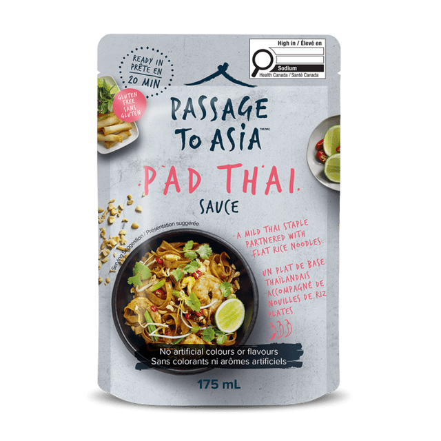 Passage To Asia Sauce - Pad Thai (175ml) pouch with light grey packaging featuring red and black text, an image of Pad Thai noodles garnished with lime, peanuts, and herbs, gluten-free label, ready in 20 minutes, no artificial colours or flavours, and a high sodium Health Canada warning, suitable for Thai and Southeast Asian cooking.