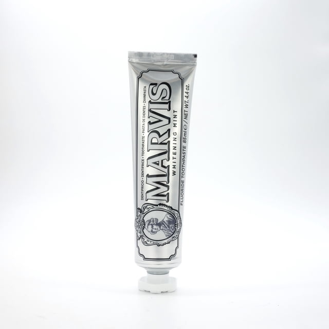Marvis - Whitening Mint Toothpaste (85ml) front-facing Marvis tube with mint label; whitening toothpaste described to remove plaque and tartar while providing a refreshing mint flavor, 85ml tube ideal for travel toiletry kits or keeping in a gym bag between meetings.