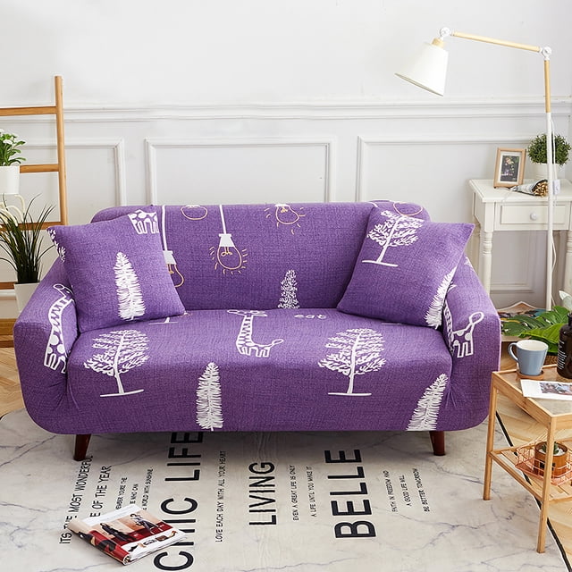 1/2/3/4 Seater Elastic Sofa Covers Slipcover Settee Stretch Floral Couch Protector shown on a purple sofa with white tree and giraffe patterns. Made of stretchable polyester fiber, it fits various sofa sizes and protects against stains, pet hair, and wear. Ideal for home décor, weddings, and events. The living room setting includes a side table, lamp, and decorative plants.