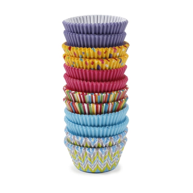 Pillsbury 300 Paper baking cups in assorted colours stacked vertically showing solid purple, yellow with multicolour spots, solid pink, multicolour stripes, solid blue, and blue-green chevron patterns, made from 40gsm grease-proof paper ideal for baking muffins and cupcakes and suitable for serving snacks.