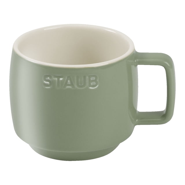 STAUB Ceramique Ceramic Coffee Mug in Eucalyptus green, with a 250ml capacity and ergonomic handle. This durable ceramic mug features a pastel green finish, is microwave and dishwasher safe, temperature-resistant up to 300°C, and ideal for stacking or hanging for storage.