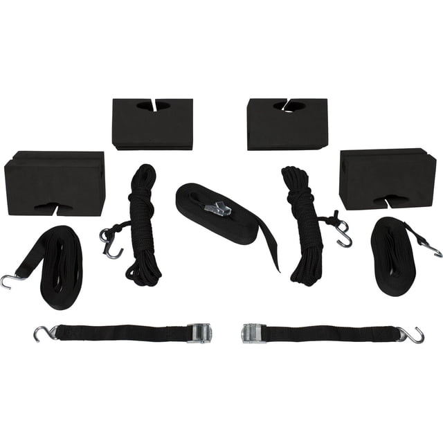 World Famous Universal Canoe Carrier Kit with four black closed-cell foam blocks with cut-out notches, two adjustable black webbing straps with metal hooks, two coiled black securing ropes with S-buckle hooks, and one over-hull webbing strap with cinch buckle, designed to securely strap most standard to large canoes to bare car roofs or factory roof racks.