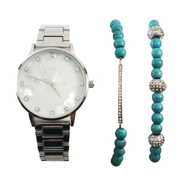 Ladies Silvertone Watch and Bracelet Set with a 35mm silvertone watch featuring a white mother of pearl dial and crystal hour markers on an adjustable link bracelet, paired with two stretch turquoise semi-precious look bracelets accented with silver and crystals, symbolizing serenity, suitable for everyday wear or as a gift.