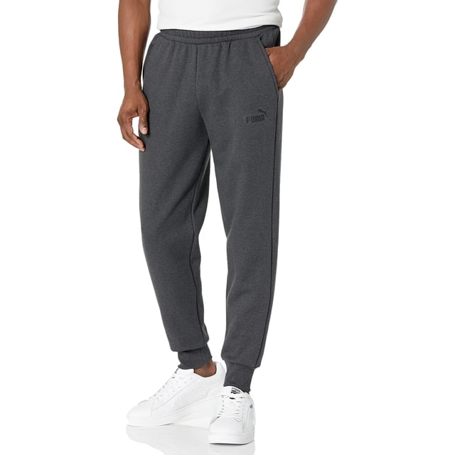 PUMA Men's Essentials Logo Fleece Sweatpants in Dark Gray Heather, size Large. These regular-fit sweatpants feature an elastic waistband, ribbed cuffs, and the PUMA logo on the left thigh. Made from soft fleece material, they provide comfort and warmth. Suitable for casual wear or light activities.