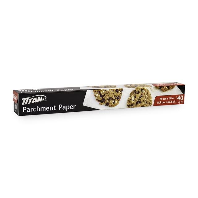 TITAN Bleached Parchment Paper roll measuring 38 cm by 10 m (14.9 in by 32.8 ft) in black packaging with images of chocolate chip cookies on parchment, ideal for oven-safe baking, cooking, and food wrap to protect cookware and reduce cleanup.