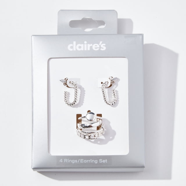 Claire's Jewelry Set Includes 20mm Silver Earrings Rope Style, and 4 Rings Size Small/Medium, Gift Box, Female, 91549 front-facing close-up of a gift-boxed silver set showing one 20mm rope-style loop earring and four small/medium rings with twisted and plain bands on a white insert; suitable for gifting and often used for school dances.