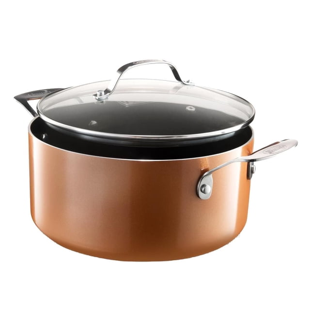 Gotham Steel 5 Qt. Aluminum Cast Textured Coating Non-Stick Stock Pot with Glass Lid shown in a 3/4 front view, featuring a copper-colored aluminum body with a triple-layer nonstick textured surface, stainless steel cool-touch handles, and a clear tempered glass lid, suitable for cooking large batches of soups and stocks with even heat distribution and easy dishwasher cleanup.