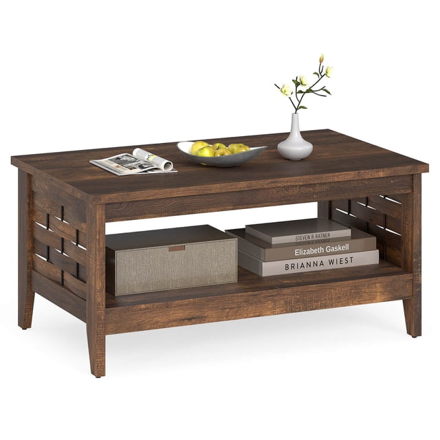 Costway Table Basse à 2 Niveaux de 39,5 Pouces avec Tablette Ouverte Décorations Tressées Rangement pour Salon en Brun Rustique. Cette Table Rectangulaire Présente un Dessus Spacieux pour Déco Ou Usage Quotidien et une Tablette Ouverte Inférieure pour Rangement. les Côtés Sont Ornés d'Accentations Tressées Élégantes, Ajoutant un Charme de Style Ferme. Fabriquée en Bois d'Ingénierie et MDF, Elle Présente des Pieds Robustes avec des Patins Antidérapants pour la Stabilité. Dimensions Sont 39,5 Pouces x 23,5 Pouces x 19 Pouces.