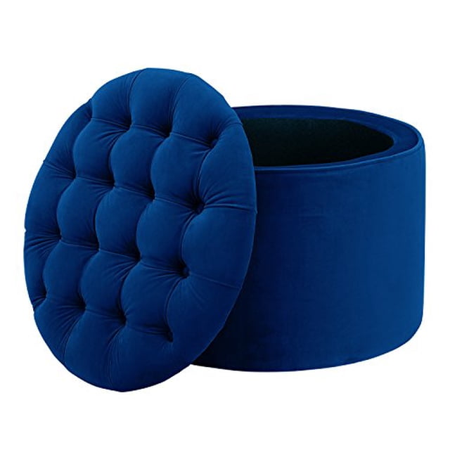 TOV Furniture Queen Velvet Storage Ottoman in navy blue, designed for living room furniture. Features a round shape with a button-tufted removable top, solid wood frame, and velvet finish for a luxurious look. Offers hidden storage and measures 21 inches wide, 21 inches deep, and 16 inches high. Suitable for use as a footstool or extra seating.