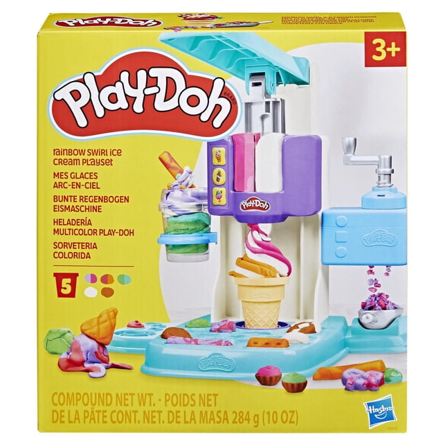 Play-Doh Rainbow Swirl Ice Cream Playset with a purple and turquoise toy ice cream machine that spins multicolored Play-Doh swirls into a cone and cup. Includes a sprinkle dispenser, spoon, knife, dish, and cone on a turquoise base. This arts and crafts dough set encourages imaginative pretend play with 10 oz of colorful modeling compound.