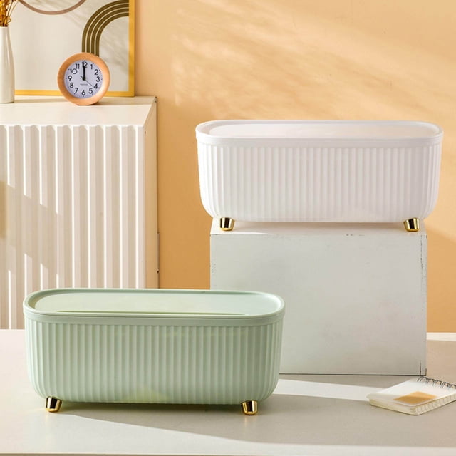 pitrice Cable Management Box Cable Organizer wire Cable Organizer Power Strips Box for Home Office in light green, designed for cord storage and wire concealment. Features a ribbed texture and gold-tone legs, with a white variant displayed in the background on a tabletop.