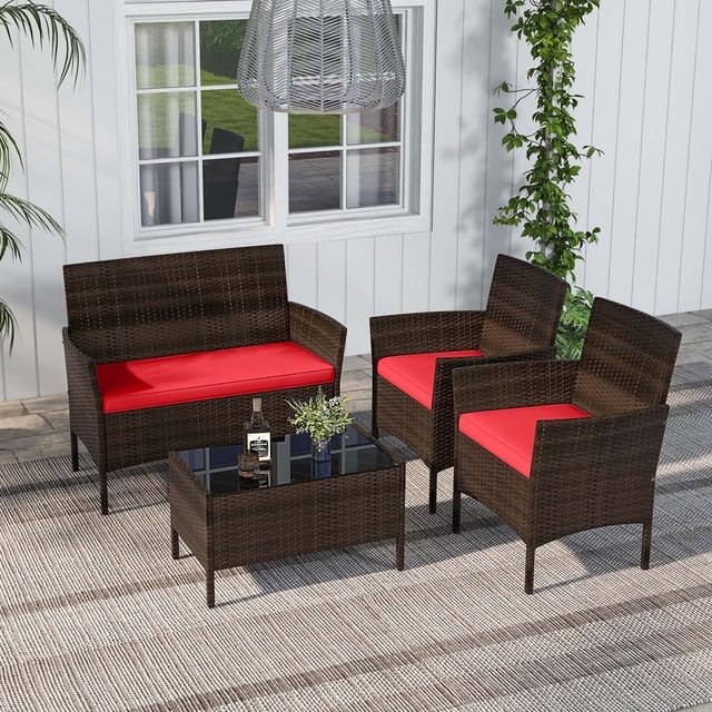 Costway 4 PCS Patio Furniture Set with mix brown PE rattan loveseat, two armless chairs, and a tempered glass coffee table. Includes washable red cushions with removable covers for easy cleaning. A versatile conversation set suitable for patios, gardens, and poolside relaxation.