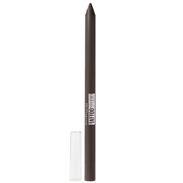 Maybelline New York Tattoo Studio® Eye Liner Deep Onyx pencil eyeliner with sharpened dark brown tip and clear cap beside it on white background, delivering waterproof, smudge-resistant, 36-hour wear for precise eye definition, also suitable for detailed eye art.