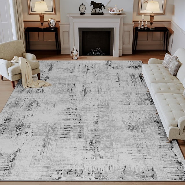 SIXHOME Area Rugs for Living Room 8'x10' with a modern abstract design in grey tones. This distressed, machine washable rug is ideal for high-traffic areas and complements transitional, contemporary, and rustic decor styles. Shown in a living room setting with furniture partially placed on the rug, highlighting its large size and versatility.