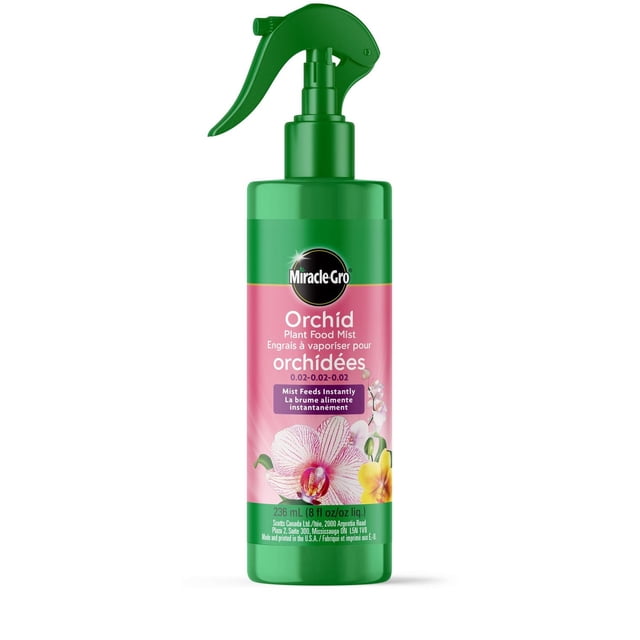Miracle-Gro Orchid Plant Food Mist 236mL in a green spray bottle with trigger nozzle, featuring a pink label with orchid images and bilingual text, a nutrient-rich hydrating mist that feeds orchids instantly with a 0.02-0.02-0.02 formula, ideal for easy weekly use to promote healthy growth and vibrant blooms.