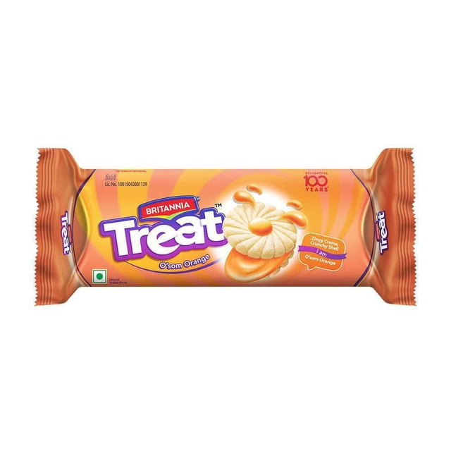 Britannia Orange Cream Treat 100 g pack showing two round, light brown sandwich biscuits with a textured surface and bright orange tangy cream filling, set against an orange gradient background with branding and product details, highlighting the crispy biscuit shell and refreshing citrus flavor.