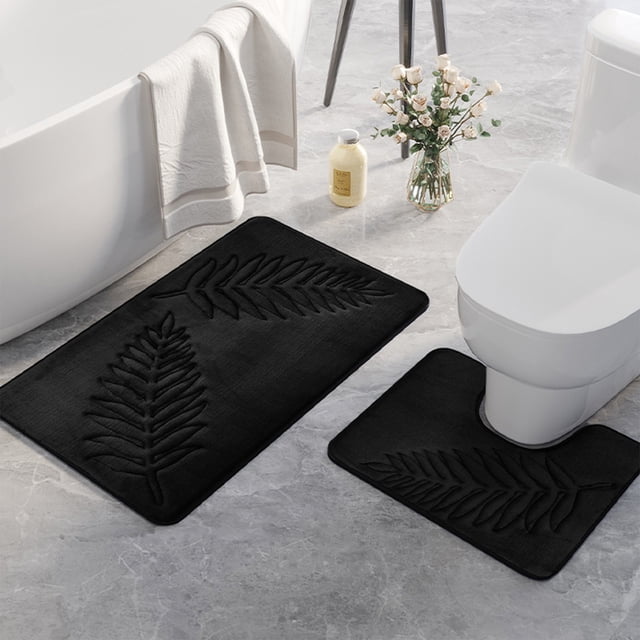 Fridja Summer Clearance Bathroom Rugs Sets 2 Piece Non Slip, black leaf-patterned bath mats made of polyester with rubber backing. Includes two mats, one rectangular and one contoured, ideal for bathroom floors near the bathtub and toilet. Ultra-soft, water-absorbent, quick-drying, and machine washable, these mats enhance modern bathroom décor while providing non-slip functionality. Perfect for bathroom rug sets and modern bathroom mats.