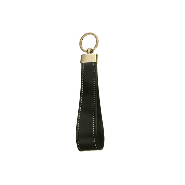 Porte-clés en Cuir Véritable Noir avec Anneau et Fermoir en Métal Ton Or, Doté de Bords à Double Piqûre et d'Une Sangle à Boucle, Idéal comme Accessoire de Voyage et Organisateur de Clés, Isolé sur Fond Blanc.