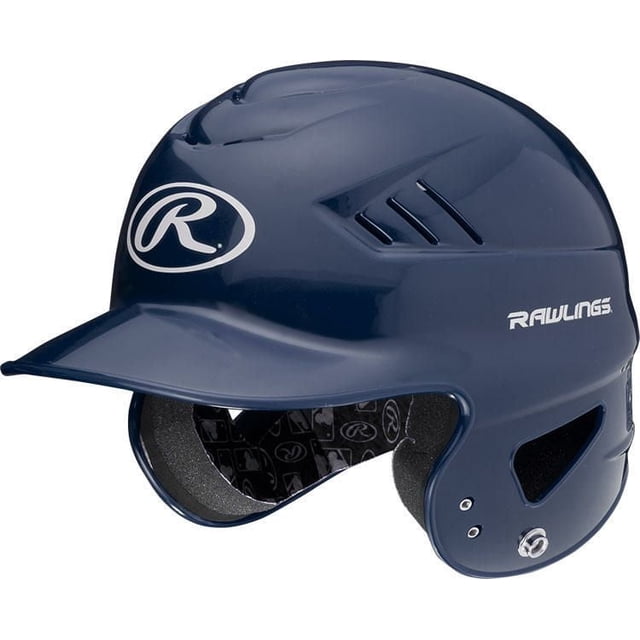 Rawlings Coolflo Navy T-Ball Helmet in a 3/4 profile view with a glossy navy blue shell, white Rawlings logos on front and side, double ear design with ventilation slits, foam padding inside, pre-drilled for face guards and chin strap snaps, featuring 15 air vents to keep youth players cool and comfortable.