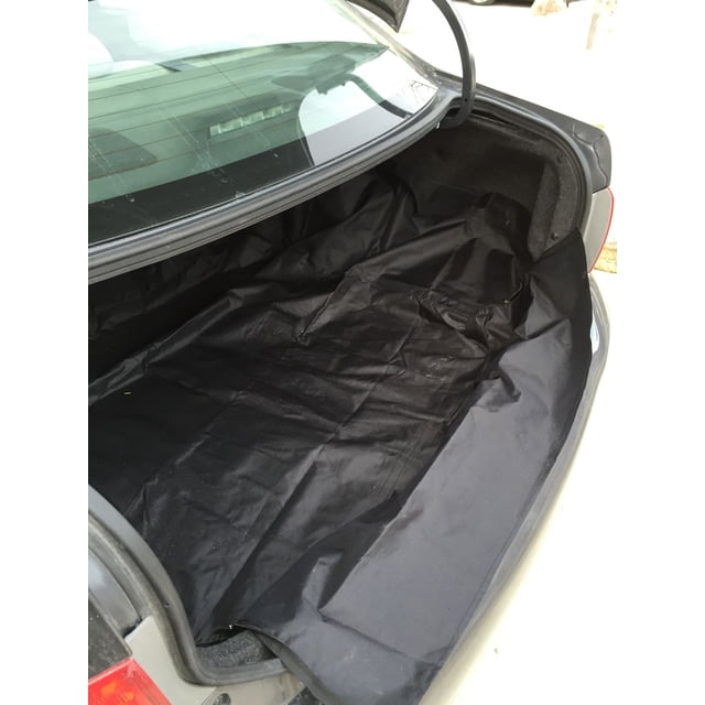 Cargo Liner Universal Car Trunk Cargo Liner installed in a car trunk, featuring a black protective liner covering the trunk floor and sides to guard against dirt, mud, and spills. Suitable for protecting cargo and preserving vehicle resale value.