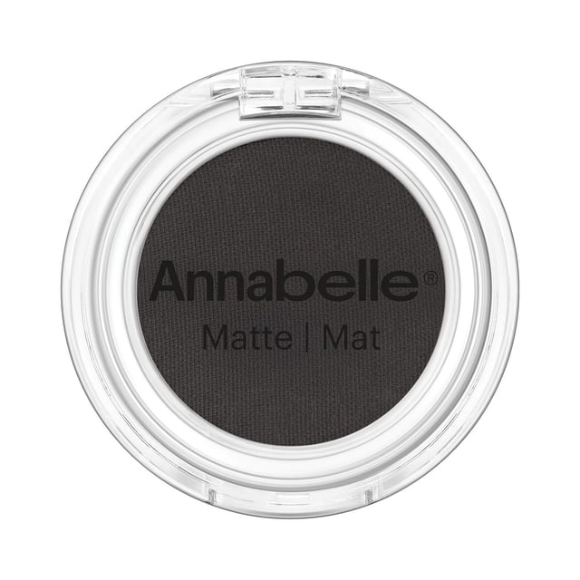 Annabelle Matte Single Eyeshadow in Ebony, shown in a clear round compact with a velvety matte black powder surface and the Annabelle logo printed on top, featuring a highly pigmented, long-lasting formula ideal for smooth, crease-free eye shading and blending.