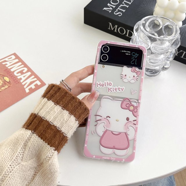 For Samsung Galaxy Z Flip 5 4 5G 3 Z Fold 5 4 5G 3 Sanrio Hello Kitty Protection Full Cover Hard PC Shockproof Transparent Case with a pink Hello Kitty cartoon design. Made of silicone TPU and acrylic PC, it provides anti-scratch, dustproof, and shockproof protection. Compatible with Samsung Galaxy Z Flip and Z Fold models, ideal for gifting during festivals.