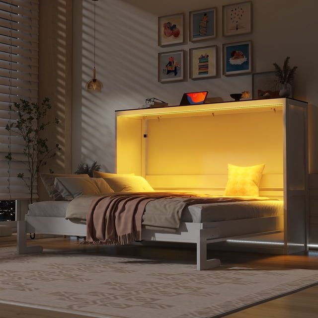 Euroco Wood Queen Size Murphy Bed with Storage Cabinets and LED Light in white, displayed in a modern bedroom. The bed is unfolded, showcasing a queen-sized sleeping area with soft bedding and a warm LED-lit interior. The wooden cabinet features integrated storage compartments, combining practicality and contemporary style. Designed for compact spaces, this Murphy bed is perfect for studios, dorms, or multi-purpose rooms.