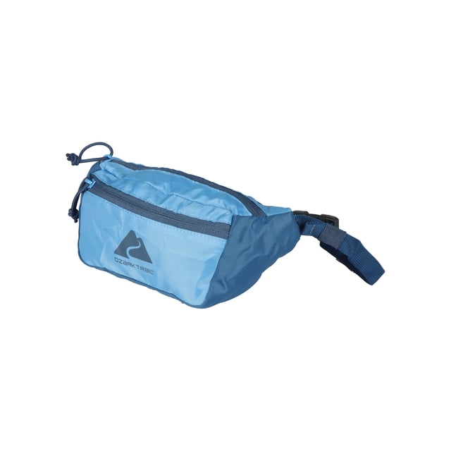 Ozark Trail Packable Unisex Waist Pack in light blue polyester with darker blue adjustable strap and zipper, featuring a large main compartment and front zippered pocket. Ideal travel bag for hiking, city exploring, or as a compact fanny pack for daily use.