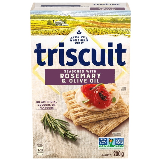 Triscuit Boîte de Craquelins au Romarin et à l'Huile d'Olive Montrant Deux Craquelins de Blé à Grains Entiers Garnis de Tartinade Crémeuse et de Tomates Rôties, avec un Brin de Romarin Frais à Côté d'Eux, Ne Mettant en Valeur Aucun Colorant Ni Arôme Artificiels et Vérifié par le Projet non-OGM, Poids de 200 g sur un Fond Texturé beige.