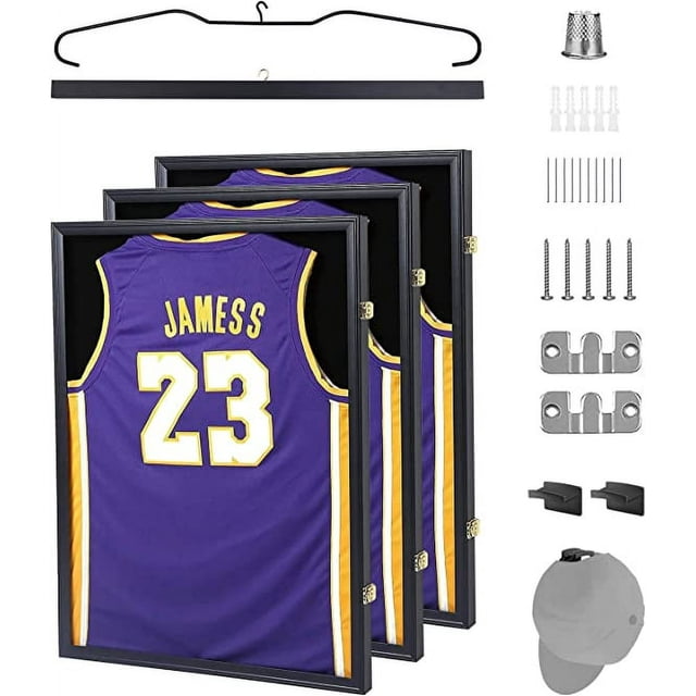 Nice C Jersey Frame Display Case, a set of three large shadow boxes designed for sports jerseys, shown with a purple and yellow basketball jersey inside. The display case features a black frame, acrylic front, and includes hangers, hookers, and mounting hardware. The set offers 98% UV protection to preserve jerseys and is suitable for football, basketball, and other sports memorabilia.