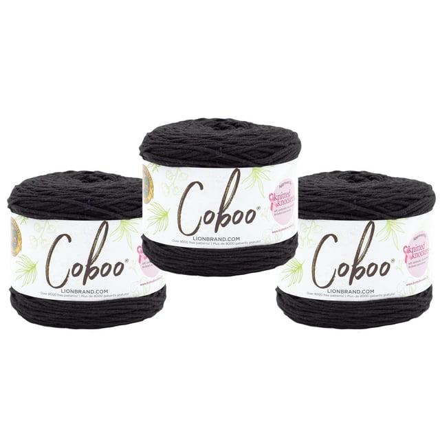 Lion Brand Coboo Yarn in black, three skeins with white labels featuring the Coboo logo and green leaf designs, made of 51% cotton and 49% bamboo, ideal for knitting year-round garments, shawls, and home décor with excellent drape and stitch definition.