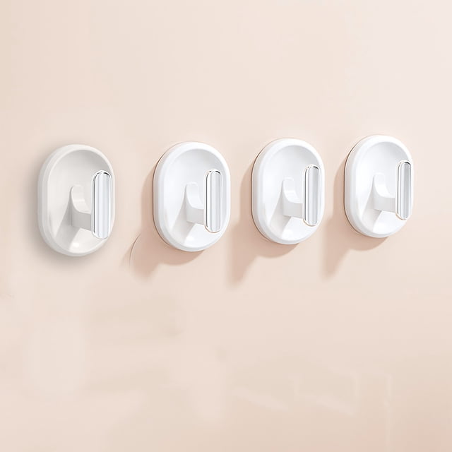 TopLLC No Punch Hooks for kitchen, bathroom, and living room shown in a set of four. These white plastic adhesive wall hooks feature a sleek oval design for easy installation on clean, dry surfaces. Suitable for hanging hats, clothes, or accessories without wall damage, ideal for utility and organization.
