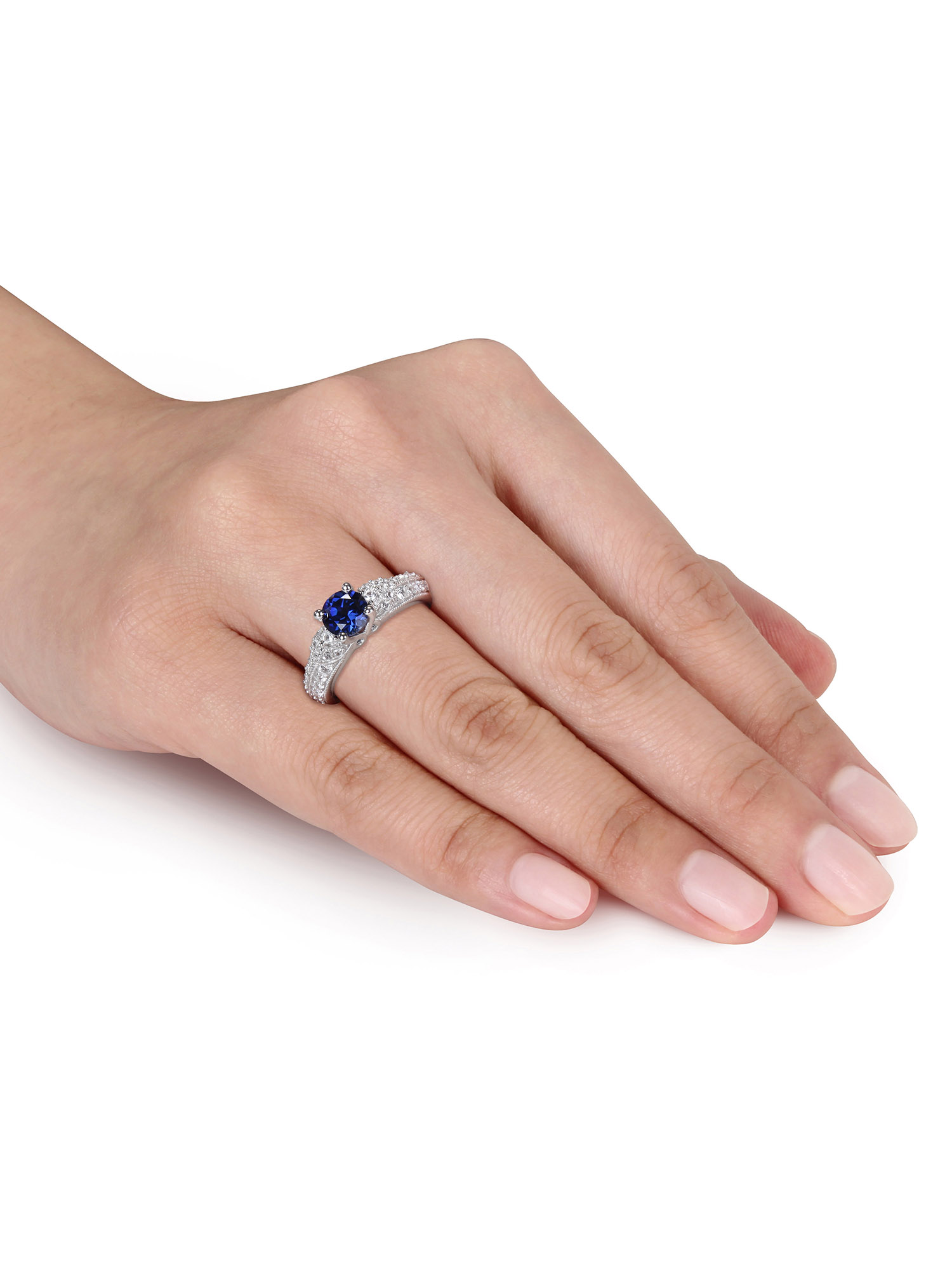 Bague de fiançailles Tangelo avec 1.67 carat de saphir bleu et blanc synthétique en argent sterling