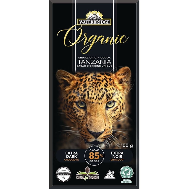 Waterbridge Organic Single Origin Extra Dark Chocolate bar with 85% cocoa from Tanzania, featuring a close-up leopard face on black packaging, 100 g, certified halal, kosher, and Rainforest Alliance certified, supporting Cocoa for Schools program.